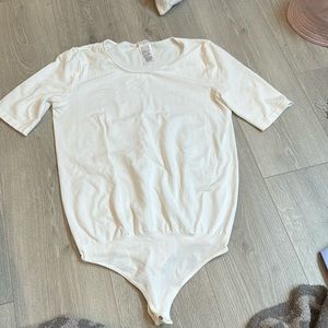Wolford short sleeve white thong bodysuit; worn once